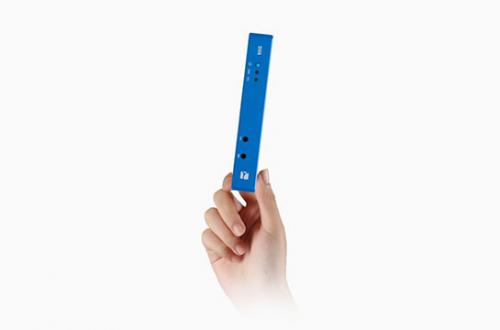 diva digital signage player in a hand