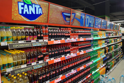 coca-cola digital retail shelf with spinetix led video wall