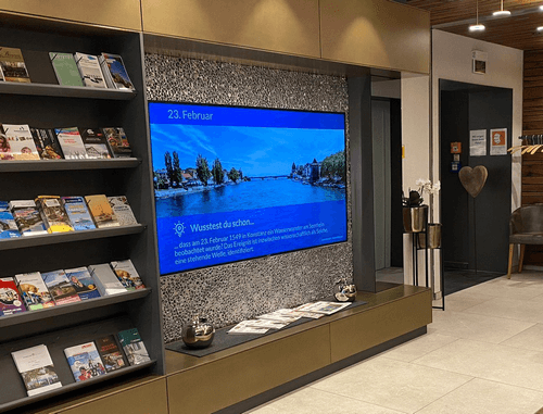 infotainment digital signage content at a host location