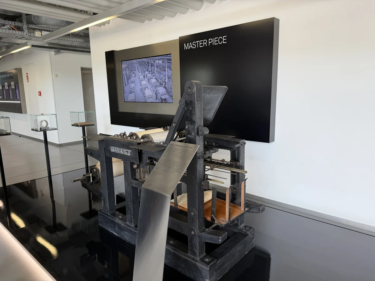 BOBST museum area with a SpinetiX display above the original press