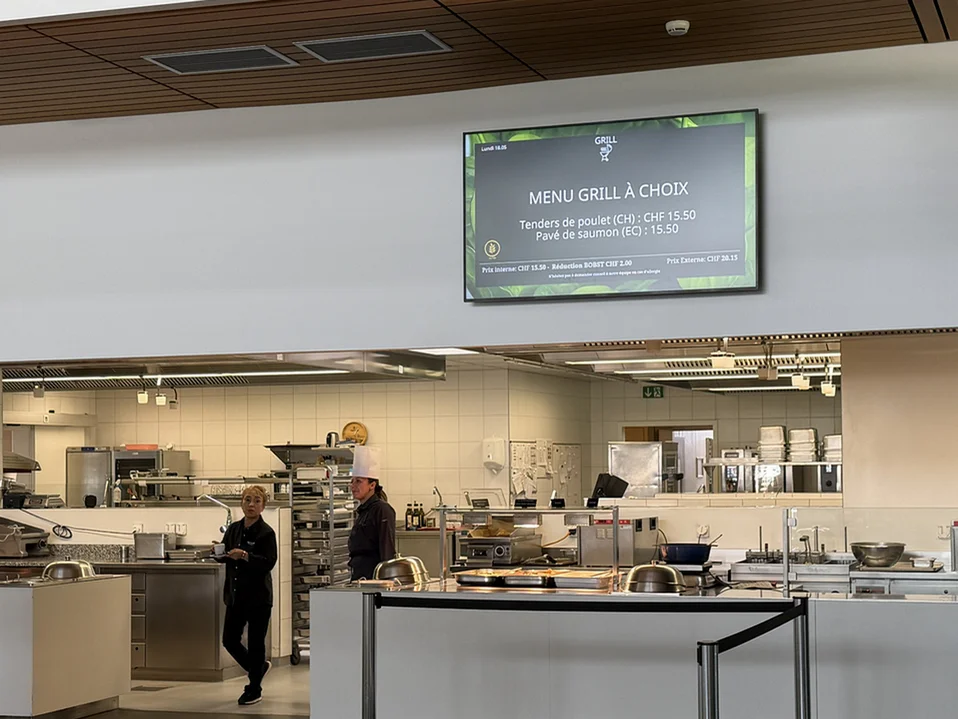 digital menu boards and corporate news screen in the BOBST employee restaurant