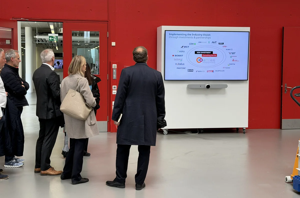 visitors at a SpinetiX-powered display during a BOBST showroom visit