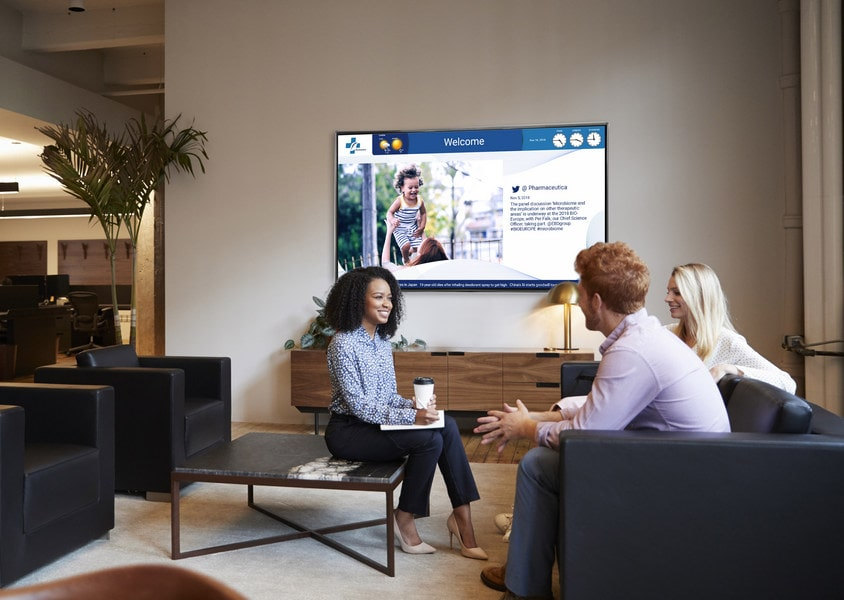 corporate welcome display with data-driven widgets
