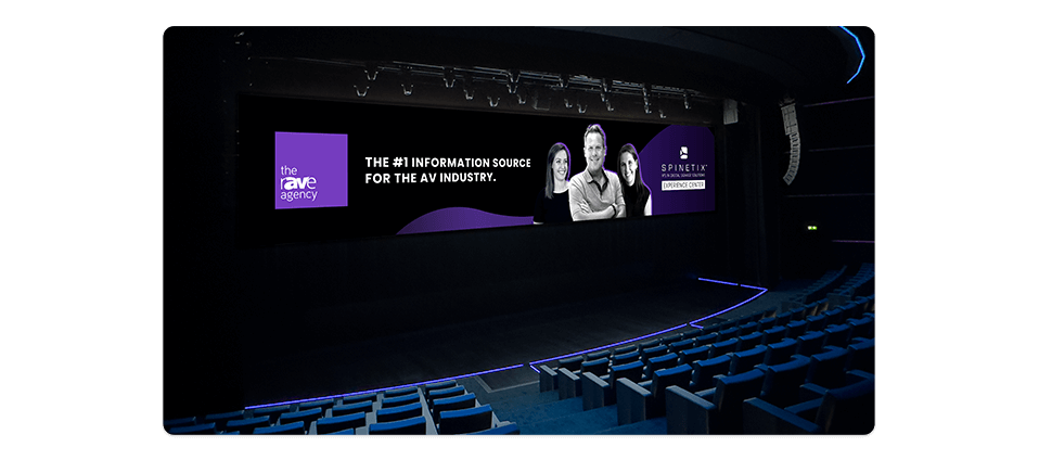 la scene - millennium building's 500-seat auditorium with large LED video wall connected to iBX440 digital signage player and a welcome display