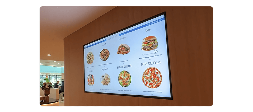 tableau de menu digital montrant le menu du jour à la cafétéria du Millennium